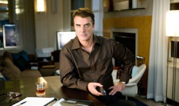 Chris Noth în rolul lui Mr. Big îmbrăcat în cămașă în biroul lui