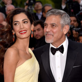 George și Amal Clooney, pe covorul roșu, la festivalul de Film de la Cannes din 2016