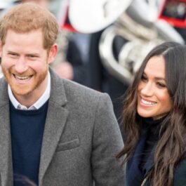 Meghan Markle și Prințul Harry surprinși zâmbind în timpul unui eveniment oficial