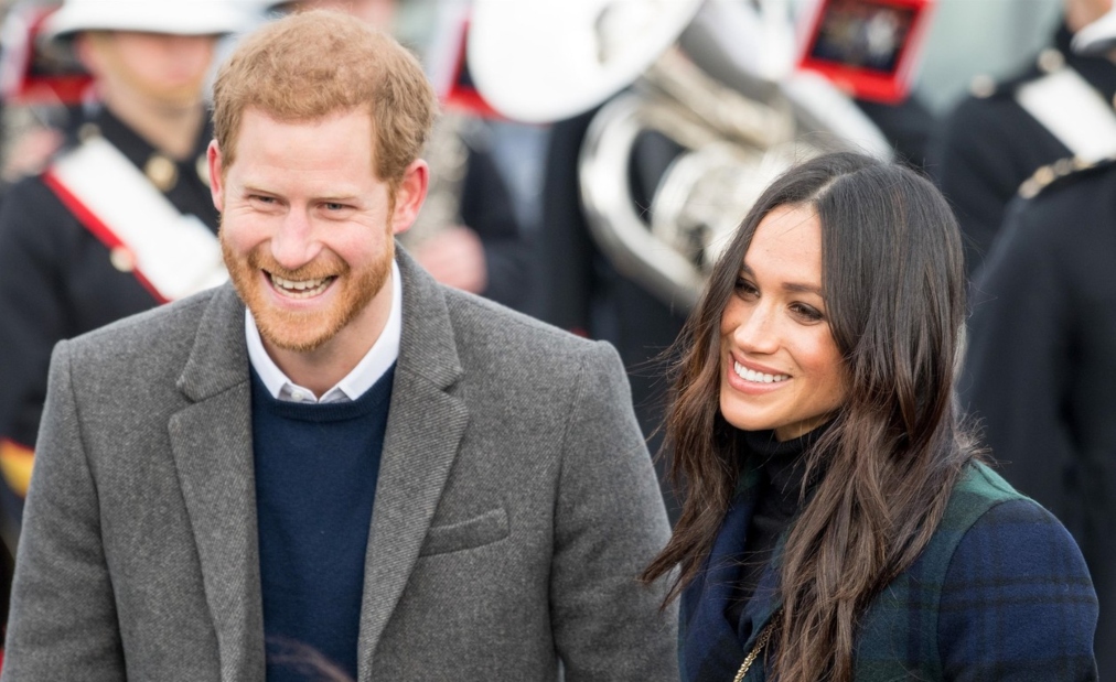 Meghan Markle și Prințul Harry surprinși zâmbind în timpul unui eveniment oficial