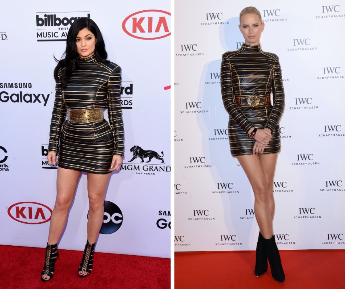 Kylie Jenner și Karolina Kurkova poartă aceeași rochie neagră, scurtă, cu detalii aurii.