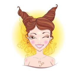 O femeie frumoasă cu părul șaten care are părul prins în două codițe în vârful capului reprezentand zodia Capricornului