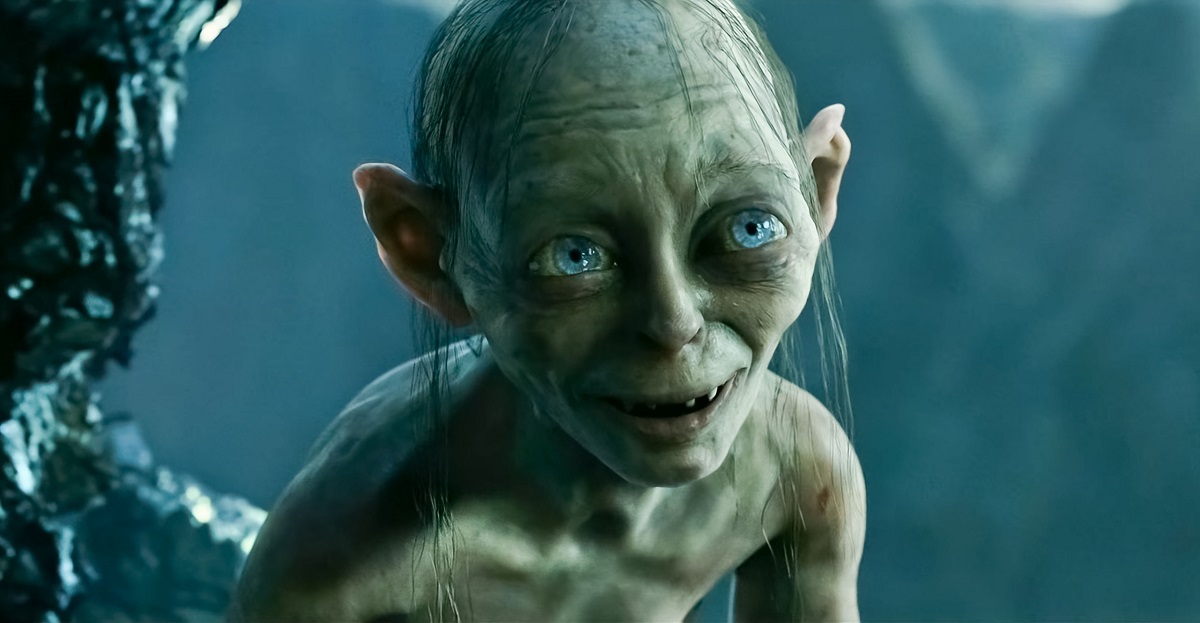 Gollum din Lord Of The Rings. Interpretat de Andy Serkis, personaj cu pielea gri, ochii albaștri și fără păr