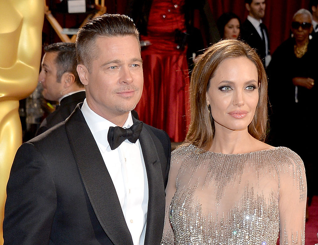 Angelina Jolie și Brad Pitt, la Annual Academy Awards, pe covorul roșu, în 2014