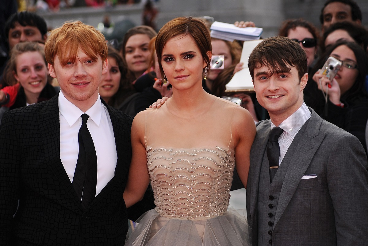 Daniel Radcliffe, Rupert Grint și Emma Watson la premiera ultimului film din seria Harry Potter în anul 2011