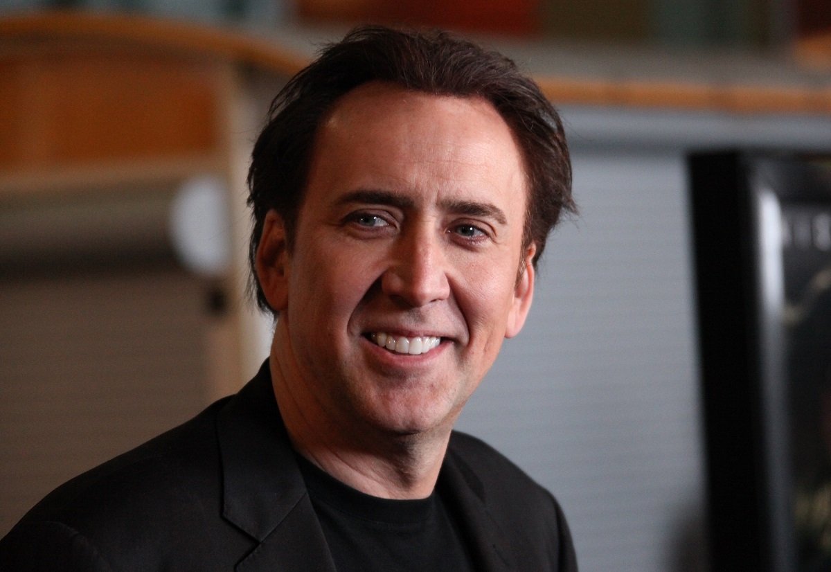 Actorul Nicolas Cage în timp ce zâmbește la premiera Drive Angry fiind una din cele 10 celebrități care și-au schimbat numele