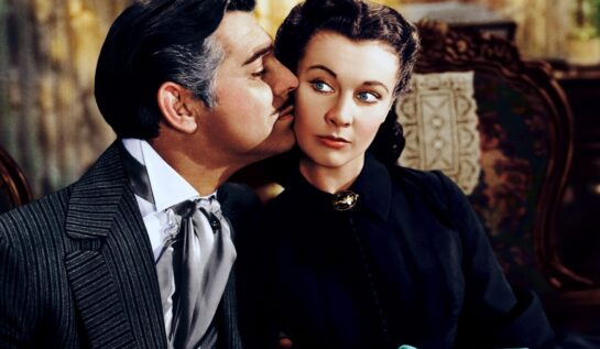 Clark Gable și Vivien Leigh într-o scenă din filmul de dragoste Pe Aripile Vântului