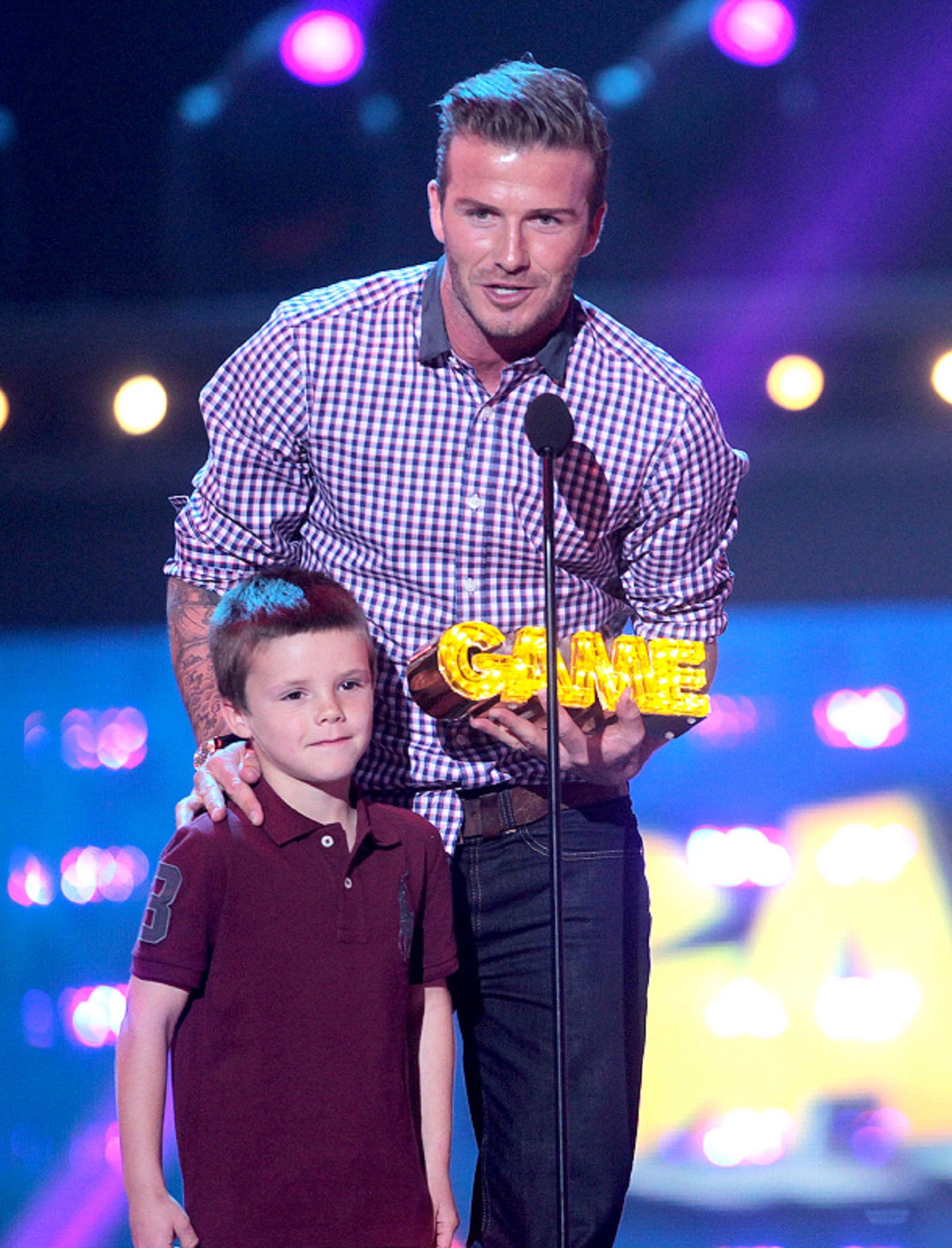 David Beckham și fiul său, Cruz, pe scenă