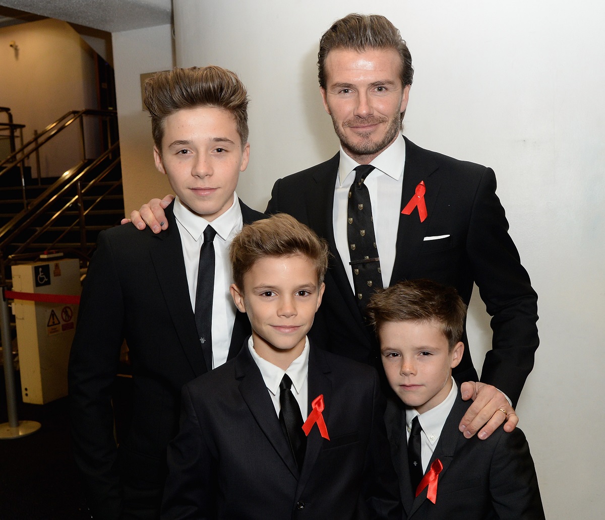 David Beckham alături de cei trei fii ai săi, Brooklyn, Romeo și Cruz