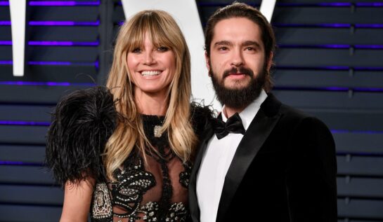 Heidi Klum și iubitul său Tom Kaulitz în timp ce pozează împreună pe covorul roșu la Gala Premiilor Oscar 2019