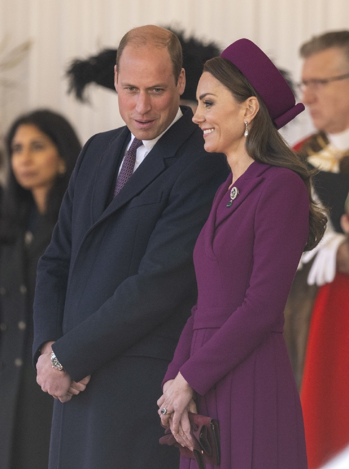 Kate Middleton într-un palton violet alături de Prințul William la întâlnirea cu Cyril Ramaphosa