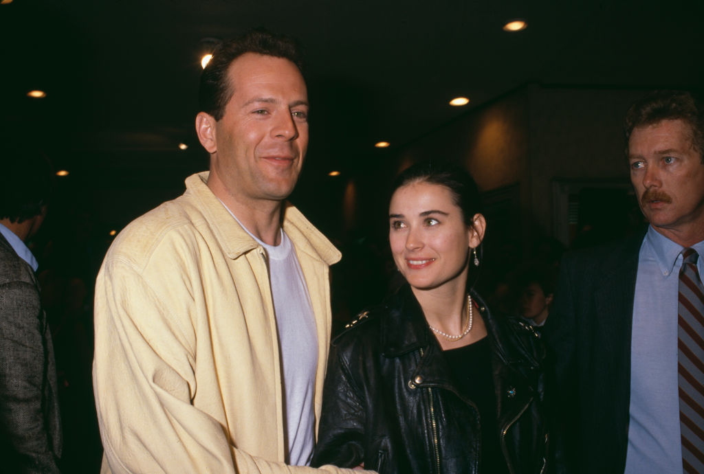 Bruce Willis și Demi Moore, la înceutul relației lor, la un eveniment