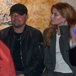Leonardo DiCaprio, îmbrăcat într-o ținută neagră, alături de o femeie misterioasă