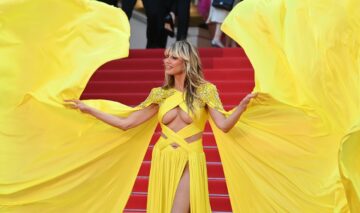 Heidi Klum, într-o rochie spectaculoasă, galbenă, pe covorul roșu de la Cannes