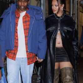 A$AP Rocky în timp ce o ține pe Rihanna de mână la o întâlnire romantică