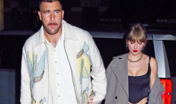 Taylor Swift și Travis Kelce în timp ce merg împreună la un restaurant de lux