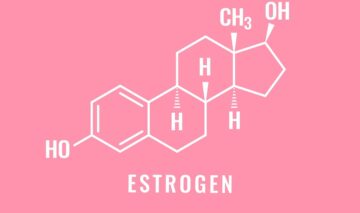 Un fundal roz pe care se află formula chimică a estrogenului
