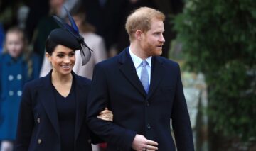Meghan Markle și Prințul Harry în timp ce pleacă de la slujba de Crăciun din anul 2018