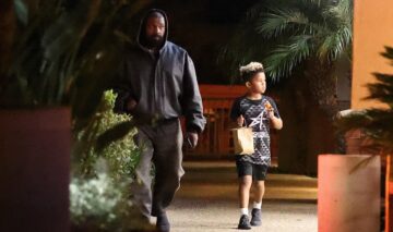 Kanye West, alături de unul dintre copiii săi, pe stradă