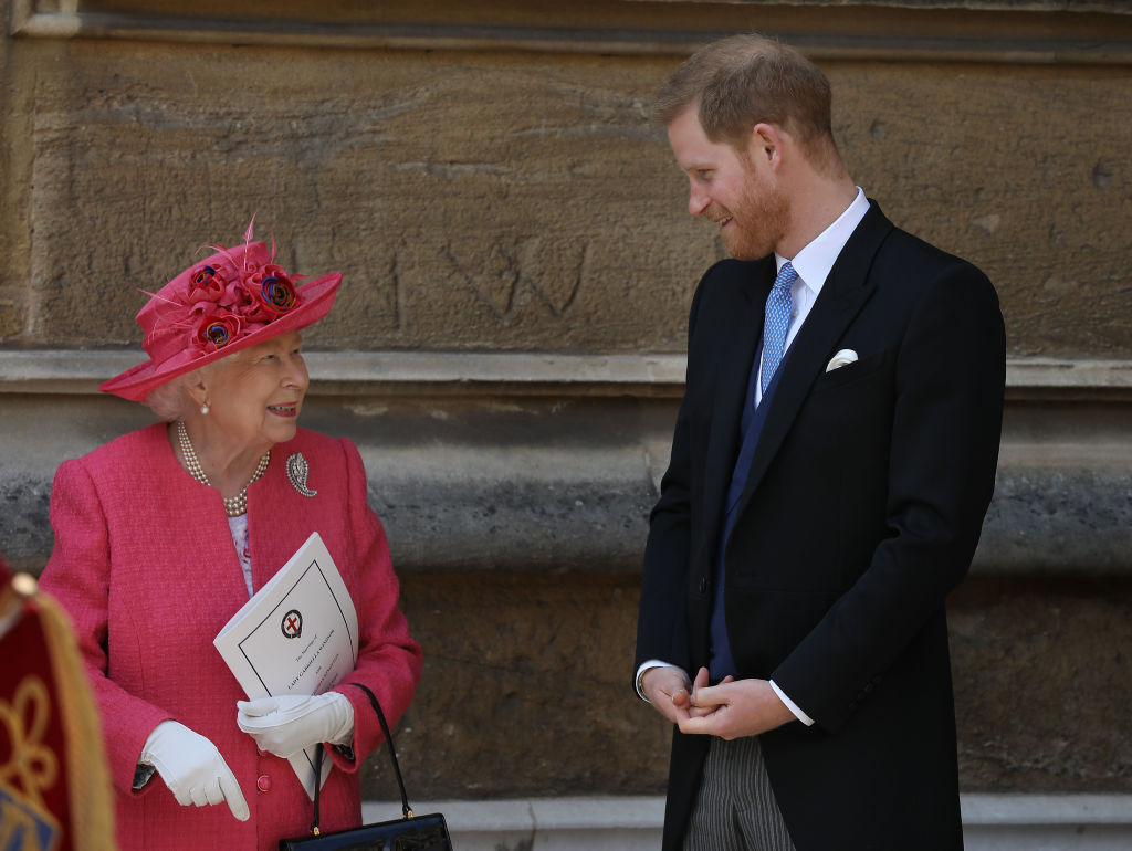 Regina Elisabeta, alături de Prințul Harry, la un eveniment